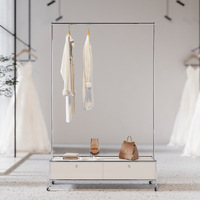 Porte-vêtements extensible et mobile en acier inoxydable avec tiroir de rangement et roulettes 360° pour la maison, la chambre et le placard