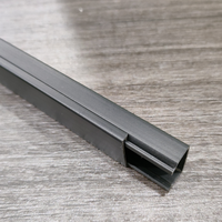 Goulotte de câble en PVC noir Conduits de câblage Upvc Système de gestion des câbles de canal