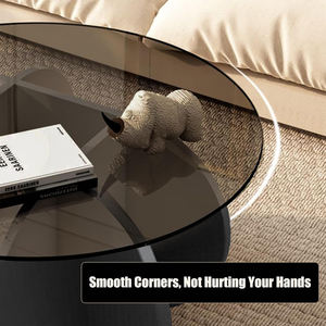 שולחן קפה עגול מודרני עם משטח זכוכית ובסיס שחור בצורת עלי כותרת לסלון - Product Image 4