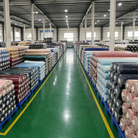 Tissu satiné charmeuse 100 % polyester à bas prix, brillant, doux, résistant à l'abrasion, pour la décoration, les nappes et l'emballage