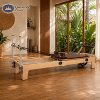 QueenLife Reformer Pilates à cadre en bois, machine de rééducation avec ressorts allemands, appui-tête réglable, équipement de physiothérapie pour studio