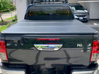 Couverture de benne rigide pliable en trois parties en alliage d'aluminium 4x4 de haute qualité, étanche, pièces et accessoires pour pick-up Hilux 2024