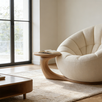 Fauteuils pivotants contemporains ronds et confortables, canapé design unique en forme de pétale avec table d'appoint intégrée, mobilier de réception pour hall d'hôtel