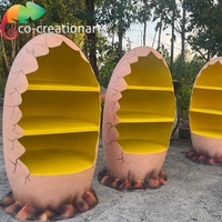Œuf de dinosaure interactif en fibre de verre pour parcs à thème, permettant de prendre des photos