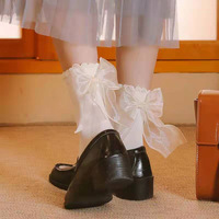 Chaussettes en dentelle mignonnes à la mode avec nœuds japonais Jk et princesse Lolita Style chaussettes mi-tube de couleur unie pour les filles