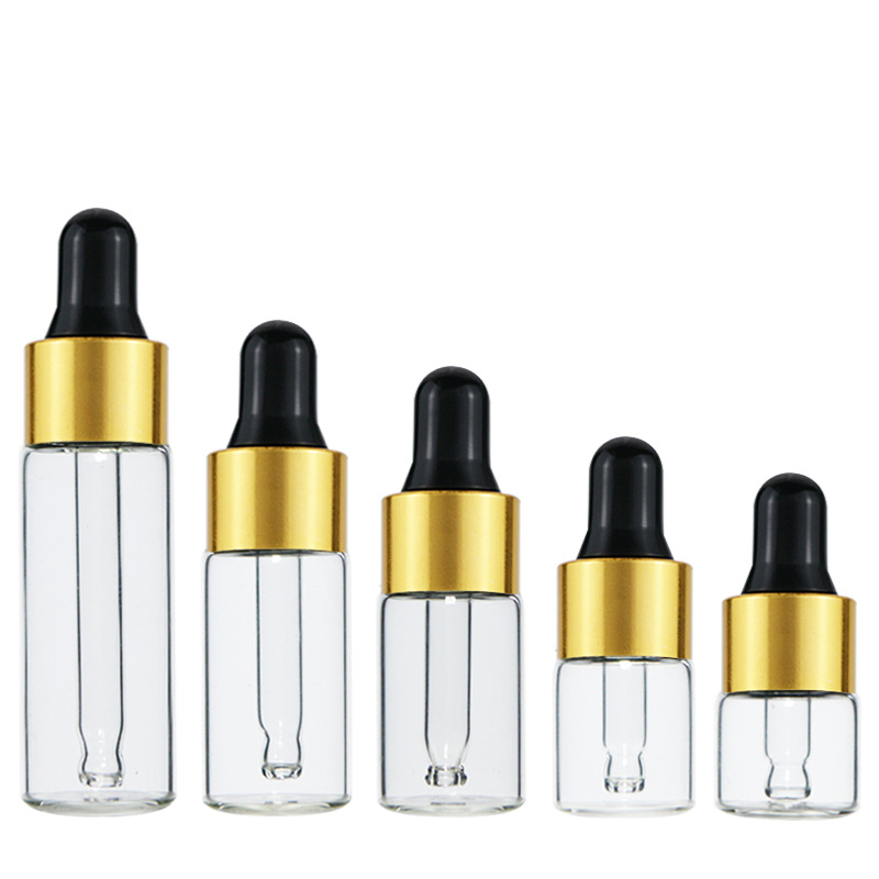 Clear bottle +gold & black dropper