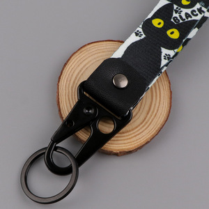 Correa de poliéster mate con estampado de pata de gato de dibujos animados en blanco y negro, clip de águila, llavero de gatito, regalo para amantes de los gatos - Product Image 5