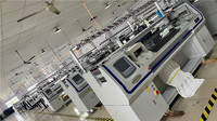 Machine à tricoter plate informatisée utilisée par atelier de chandail