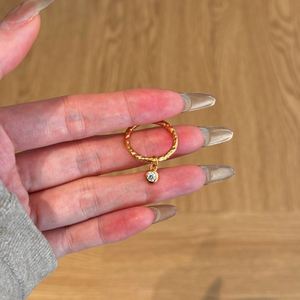 Dylam Simplicity Design Fine Charm 22K Gold Plated 925 Sterling Silver <b>Wedding</b> Band Dangle 5A <b>Cubic</b> <b>Zirconia</b> Women Jewelry <b>Rings</b> - Product Image 6