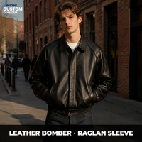 Blouson Bomber Homme en Cuir Grainé Noir Personnalisé à Manches Raglan, Poches Plissées et Boutons Pression, Coupe Boxy pour un Style Urbain Moderne