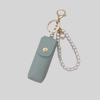 En gros, Pochette élégante pour rouge à lèvres et baume à lèvres, avec porte-clés et pendentif chaîne de perles, mini, mignonne, portable, accessoire cosmétique