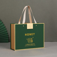 Vente en gros de boîtes-cadeaux en carton rigide magnétique de luxe sur mesure pour pots de miel, emballage en papier pour pots de miel avec poignée pour 500 g de miel