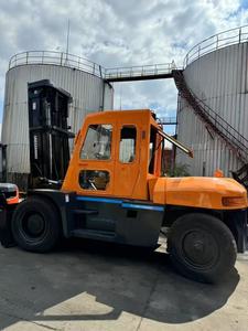 Chariot élévateur d'occasion TCM FD100 10 tonnes de qualité fiable, idéal pour les entrepôts de conteneurs, les quais forestiers et le transport de marchandises industrielles de taille moyenne à lourde. - Product Image 1