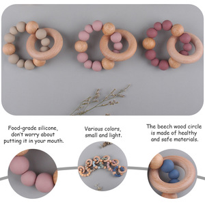 Vente en gros Mélange de couleurs pour bébé Anneau de dentition souple en silicone PC Perles et anneau en bois 12mm <span class=keywords><strong>Bracelet</strong></span> d'allaitement à mâcher de qualité alimentaire Jouet doux - Product Image 2