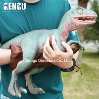 Marionnette de dinosaure faite à la main, simulation de bébé dinosaure
