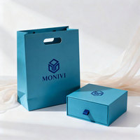 Emballage de luxe pour le shopping, poignées découpées, logo personnalisé, design bleu, sac cadeau en papier de qualité supérieure pour transporter des produits de beauté, des bijoux, des sous-vêtements, ensemble de boîtes