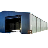 Edificio de Almacenamiento Industrial de Estructura de Acero Prefabricada Grande con Puerta Enrollable para Almacenamiento Industrial y Logística