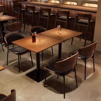 Fauteuil et table en cuir de café en bois massif Restaurant commercial Table à manger en bois massif écologique Couleur personnalisée pour