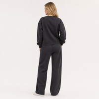 Ensemble survêtement femme noir oversize col rond et pantalon large en polyester – Style automne-hiver