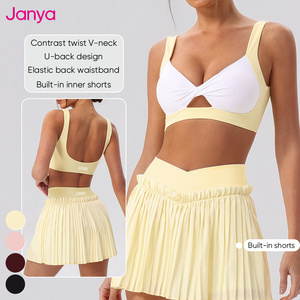 Ensemble de tennis 2 pièces pour femme Janya : Haut court respirant à col polo et col en V en Spandex/Nylon et jupe plissée de golf, color block - Product Image 3