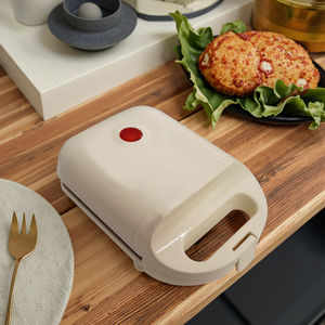 ماكينة تسخين الوافل والخبز الكهربائية المنزلية مزدوجة الوجهين والأجهزة البلاستيكية للقلي والخبز - Product Image 1