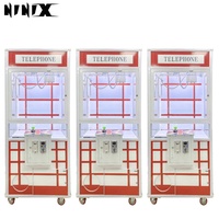 Superbox NINIX Machine à poupées - Machine de jeu d'arcade pour enfants personnalisable, avec fonctionnalités basées sur les compétences, Leon Capsule World, US
