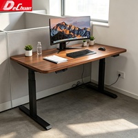 Bureau debout électrique à double moteur de l'usine de Foshan avec capacité de charge de 150 kg et colonne de levage à 3 niveaux