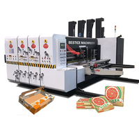 Machine de fabrication de boîtes en carton ondulé avec impression flexographique, découpe et rainurage électriques