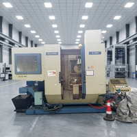 Centre d'usinage CNC 5 axes d'occasion W-428P de fabrication suisse pour pièces aérospatiales, en titane et médicales – Centre de fraisage de seconde main