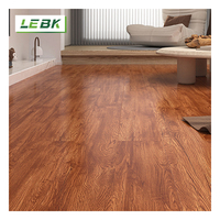 En stock : Revêtement de sol en vinyle imitation bois, planches de vinyle effet pierre, revêtement de sol SPC, revêtement de sol flottant imperméable SPC de Foshan pour salons