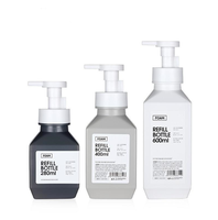Flacon pompe en plastique PET design tendance à épaule oblique pour savon moussant et crème visage 280ml 400ml 600ml