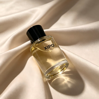 Flacon de parfum en verre transparent rond de haute qualité OEM 50 ml 80 ml avec vaporisateur à sertir et couvercles noirs de luxe
