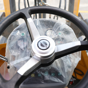 Carregadeira de rodas 4x4 a diesel XAC de 4 toneladas, equipada com sistema hidráulico, possui forte capacidade de escavação e é de cor amarela. - Product Image 5