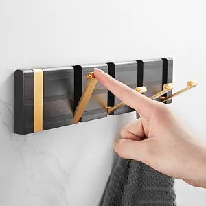 Hochwertige nordische dekorative Wandbehang Metall Wohnzimmer Schrank Handtuch Mantel Kleidung versteckte Wand faltbare Haken