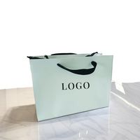 Sacs cadeaux en papier kraft personnalisés avec ruban et logo personnalisé pour vêtements
