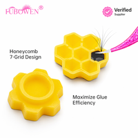En gros Fubowen Anneau de colle jetable pour extensions de cils, nid d'abeille 7 trous, forme fleur de prunier, pour greffage
