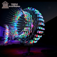 Sculpture cinétique rotative en acier inoxydable TREVI pour l'extérieur avec éclairage LED