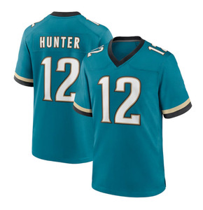 Maillot de football en promotion, tailles S-3XL # 12 Maillot de football Jacksonville pour hommes Travis Hunter Teal - Product Image 1
