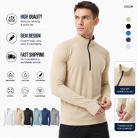 Haut de sport pour homme à demi-zip, manches longues, col montant, manches raglan, coupe ajustée, séchage rapide, respirant, personnalisable OEM, pour la course et l'entraînement