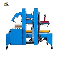 Scelleuse de cartons entièrement automatique HEKON avec détection adaptative de la taille et pliage du couvercle supérieur, machine à sceller les boîtes par ruban adhésif
