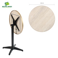 Table de jardin en pierre frittée de style moderne avec bord en aluminium, facile à nettoyer, surface lisse, idéale pour les cafés et restaurants.