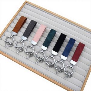 Porte-clés en PU personnalisés avec logo gravé au laser, sangle de poignet personnalisée, porte-clés en métal de haute qualité - Product Image 1