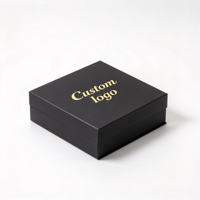 Boîte à chocolat noire personnalisée avec intérieur orange et logo en feuille d'or pour les acheteurs en gros de pralines et de truffes