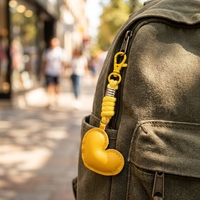 Porte-clés en cuir personnalisé en forme de cœur, écologique, avec cordon tressé, petit sac suspendu pour clés de voiture ou bijoux