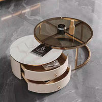 Table basse relevable moderne en pierre frittée avec rangement dissimulé, beige crème, structure métallique minimaliste, mobilier de salon