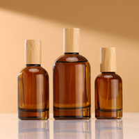 Haute qualité Transparent ovale ambre 100ml luxe air parfum vaporisateur bouteille bambou couverture vaporisateur voyage verre ensemble avec boîte