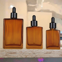 Flacon compte-gouttes rectangulaire en verre ambré 30ml 50ml 100ml pour huiles essentielles, sérums de soin et gouttes pour les yeux, avec impression de logo personnalisée