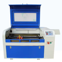 Machine de gravure laser CO2 4060 à économie d'énergie pour le marquage de panneaux en acrylique