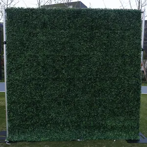 3D 인공 천 다시 롤업 녹색 식물 잎 배경 밀라노 잔디 벽