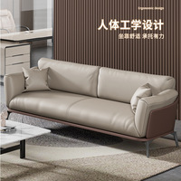 Ensemble canapé et table basse en cuir de bureau simple et moderne pour une réception d'affaires décontractée